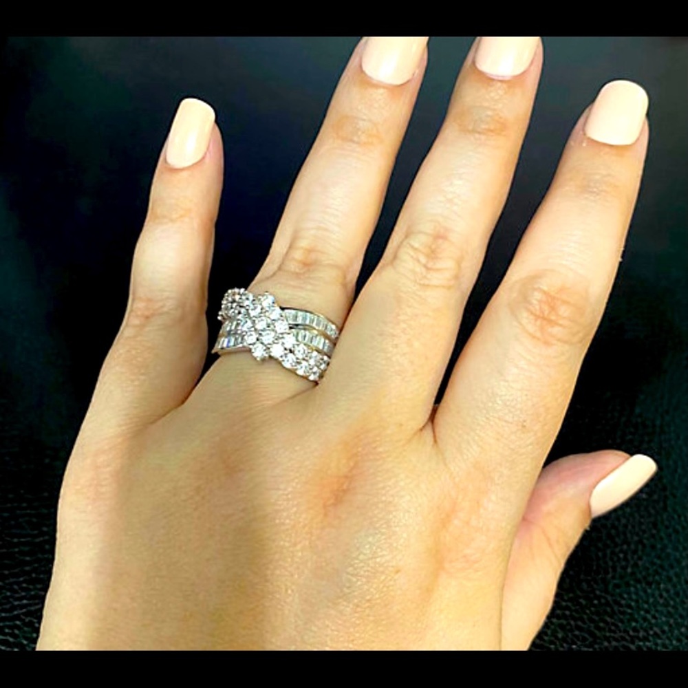 Diamonique round and baguette bypass ring